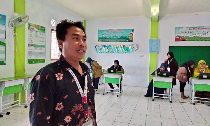 Cerita di Balik E-voting Musyda Kabupaten Probolinggo, liputan  kontributor PWMU Kota Probolinggo Izza El Mila.