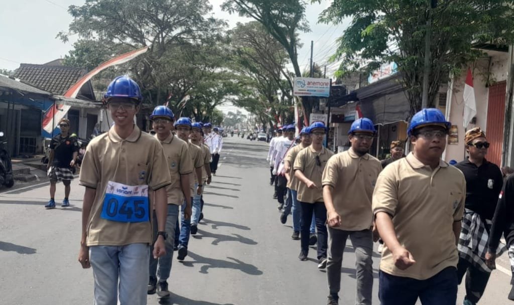Guru SMK Muda Genteng Ikuti Lomba Gerak Jalan Umum Tingkat Kecamatan