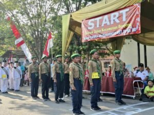 Putra SPEM EIGHT Kibarkan Prestasi di Lomba Gerak Jalan Kecamatan Benjeng