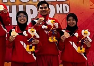 Mohammad Nizar Faro’id SM pelatih tapak suci SMP Muhammadiyah 7 Surabaya raih juara 3 pada kejurdun tapak suci 2025. (Istimewa/PWMU.CO)