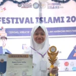 Naura Syifa, Siswi SMK Muhammadiyah 5 Jember Raih Juara 1 Kaligrafi Festival Islami 2025