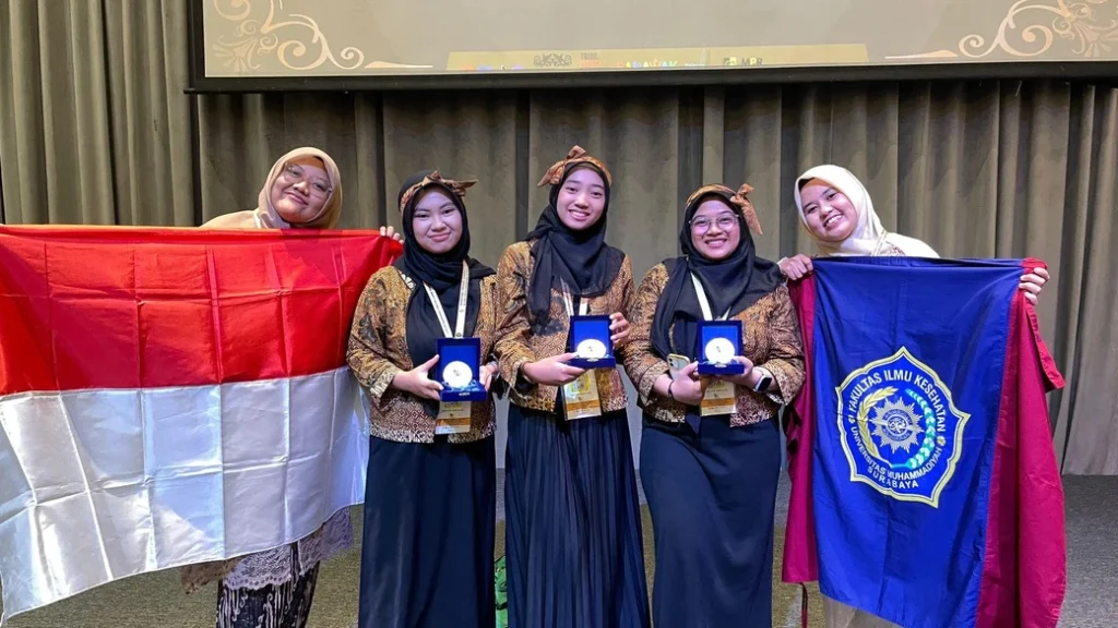 Mahasiswa FIK UM Surabaya Raih Medali Emas dan Perunggu di UTM Malaysia