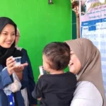 Mahasiswa KKN UMG Beri PMT Puding Bunga Telang dan Edukasi Herbal di Posyandu Prambon