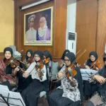 Orkestra SMAMX Sukses Memeriahkan Puncak Milad IPM ke-64 di Surabaya