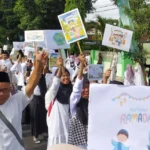 Sambut Ramadhan, Siswa SMP Muhammadiyah 1 Blitar Meriahkan Pawai Gema Soramadu Kemenag Kota Blitar