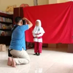 Murid SD Muhammadiyah Kota Blitar Mengikuti Pemotretan Pas Foto Rapor dan Ijazah