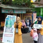 Peduli Korban Banjir Jakarta, Kader IPM Lakukan Ini di Jalan Raya