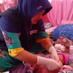 Relawan Medis Muhammadiyah Tolong Bayi Yang Terserang Hipotermia karena Kepercayaan Mistis