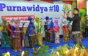 Ada Sosok Ini di Balik Tampilan Memukau SDMM Kids Orchestra