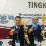Dua Medali Emas Kategori News Reading Dibawa Pulang SD Mugeb
