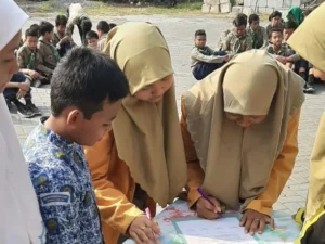 Pelantikan IPM Spemupat Diwarnai Cium Bendera dan Arak-arakan Pimpinan Baru