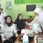 Siswa SMKM 5 Babat Beri Penyuluhan Bahaya Merokok di SMPN 2 Kedungpring