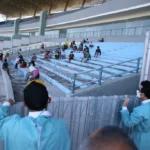 Menko PMK Beri Semangat Pasien Isoman di Gelora Joko Samudro