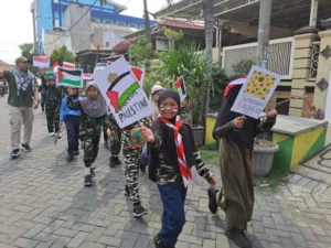 Pawai Hari Pahlawan SD Muhlas Suarakan Kemerdekaan Palestina