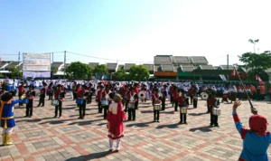 Marching Band Asal Lamongan ‘Taruna Melati’ Ramaikan Kota Gresik