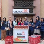 Bestiemu Lazismu Blimbing Sediakan Minuman Dingin bagi Jamaah Jumat