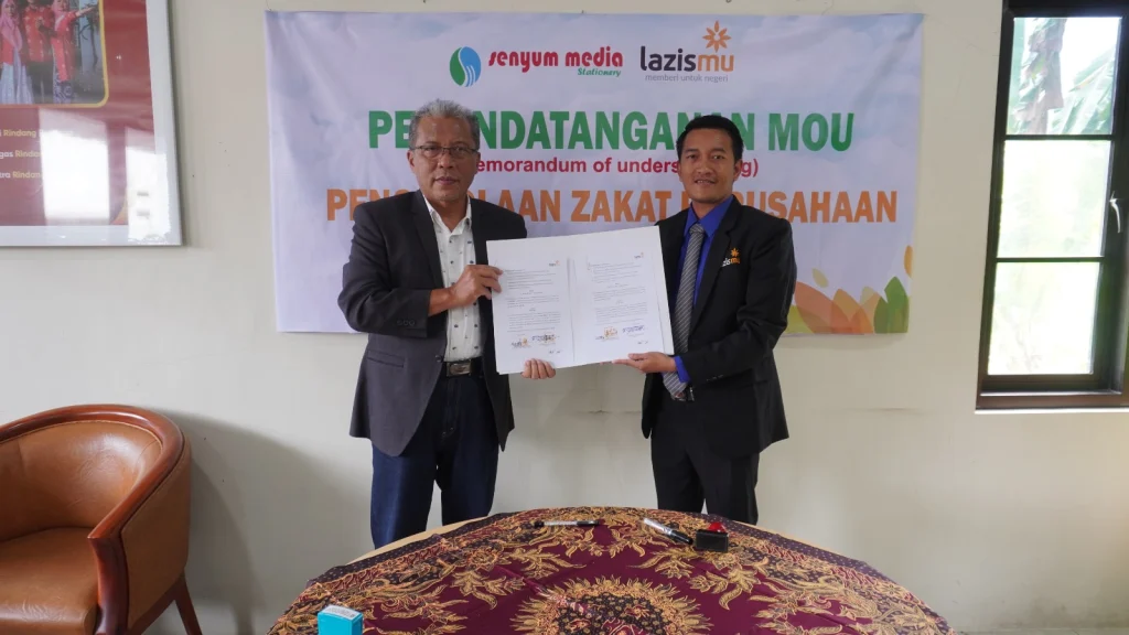 Lazismu Jember dan Senyum Media Group Teken MoU Pengelolaan Zakat Perusahaan