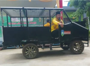 Ceramah di Atas Mobil Listrik di PCM Loa Kulu