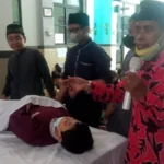 Merawat Jenazah Menutup Acara Baitul Arqam Sekolah Ini