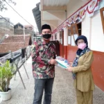 PDPM Kota Bandung Bagikan Beras dan APD