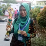 Guru SMA Taruna Gunung Pring Raih Emas untuk PTK di Olympicad