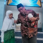 Boneka Oki  Sapa Siswa SD Muri