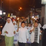 Meramaikan Pergantian Tahun Baru Hijriyah dengan Obor, Unta, dan Hadrah