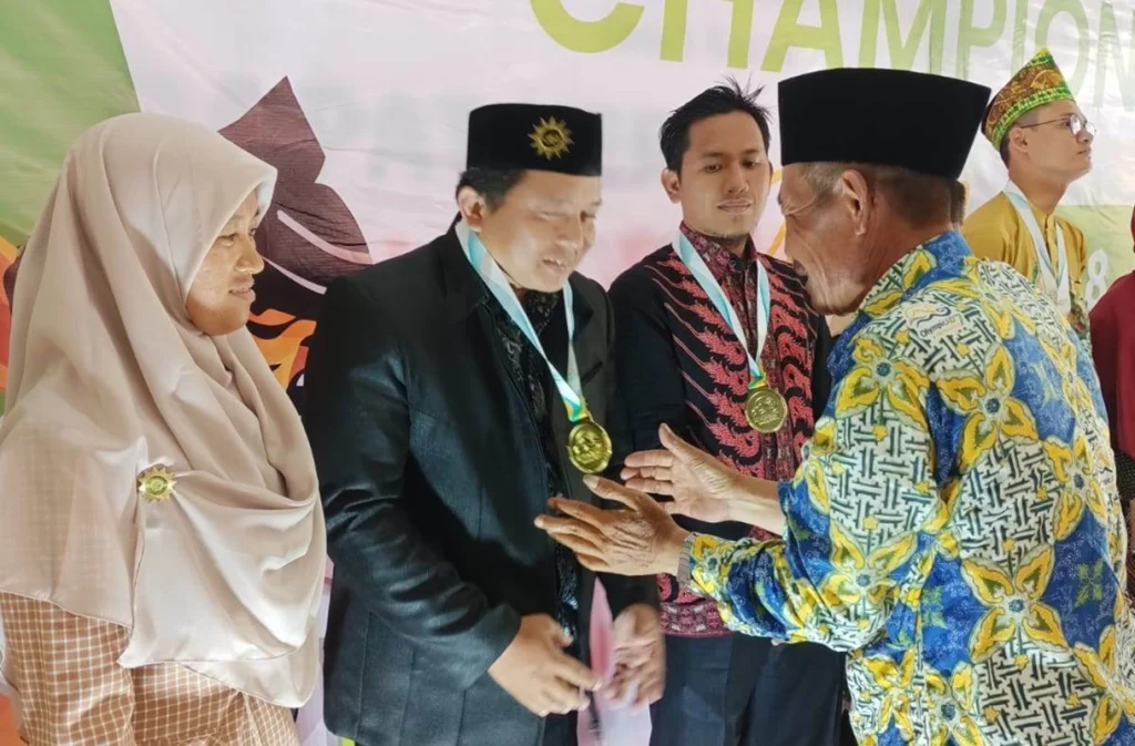 Angkat Ashabul Kahfi, Kepala SMP Mutu  Surabaya Sabet Emas Best Practice Olympicad 2024