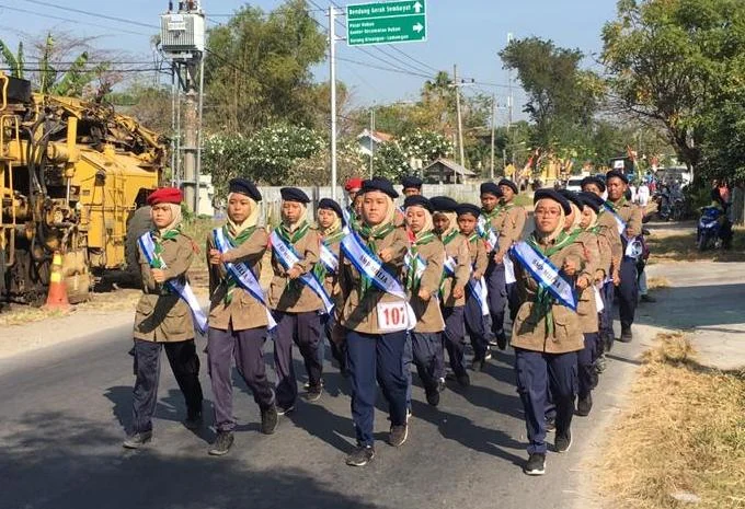 Membawa Semangat HW, Tim Putri Sekolah Ini Rebut Juara Gerak Jalan