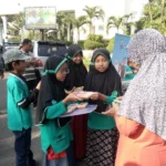Uji Talenta, Para Siswa Ini Bermain Biola dan Berdagang di Car Free Day