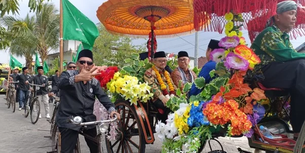 Momen Abdul Mu’ti  dan Zainuddin Maliki Naik Kereta Kencana nan Penuh Filosofi