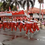 Semangat Siswa SD Muhtar Ikuti Lomba Baris-Berbaris Meski Diguyur Hujan