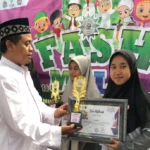 Nabila Zahidah Raih Juara I Lomba Kaligrafi di Fashmu Lamongan 2024