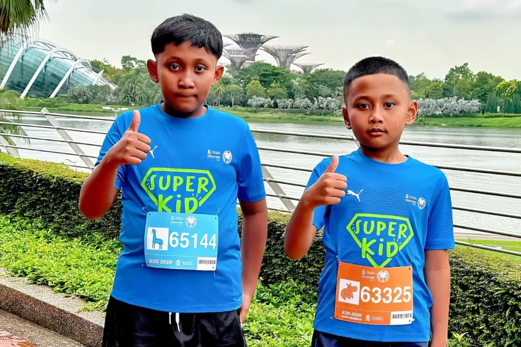 Lagi, Kakak Beradik Siswa SDMM Ikuti Singapore Marathon