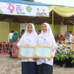 Dua Siswa MTs Muhammadiyah 15 Al Mizan Lamongan Raih Penghargaan di Hari Bhakti Kemenag