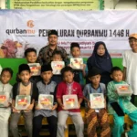 Kolaborasi Lazismu dan Telkom Grup Bahagiakan Warga Kemayoran Lewat Kurban