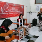 Tim Ansambel Musik SMP Muhammadiyah 8 Batu Sabet Juara 1 FLS2N 2025