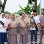Dua Siswa MTs Muhammadiyah 15 Al Mizan Lamongan Mendapat Penghargaan sebagai Duta Baca Perpustakaan