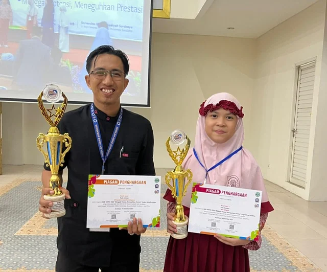 Pasangan Guru dan Siswa SD Muhammadiyah 2 Surabaya Torehkan Prestasi di Aksi Spotic 2024