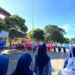 SD Muhammadiyah 19 dan SMP Muhlas Rogojampi Peringati Hari Guru Nasional dengan Upacara Bersama
