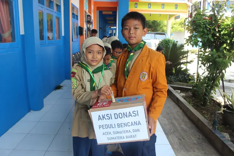 Aksi Donasi Peduli Bencana, MI Muhammadiyah 4 Brangsi Salurkan Bantuan untuk Sumatra
