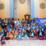 PRM Drajat II Bagikan Ratusan Paket Sembako di Semarak Milad ke-113 Muhammadiyah