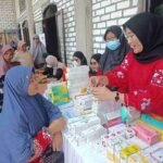 Bakti Sosial Peduli Banjir Bengawan Jero, PCM Karangbinangun Gandeng IAI Lamongan dan Forkom RS Muhammadiyah