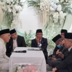 Meneguhkan Tawakal dan Keseimbangan Rumah Tangga dalam Akad Putra Ketua PWM Jatim