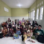 Mahasiswa KKN UMG Hadirkan Buku Prestasi di TPQ Ar-Ridho