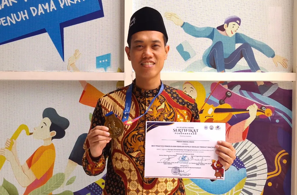 Kepala SMAMX Raih Emas OlympicAD VIII dengan Inovasi Best Practice