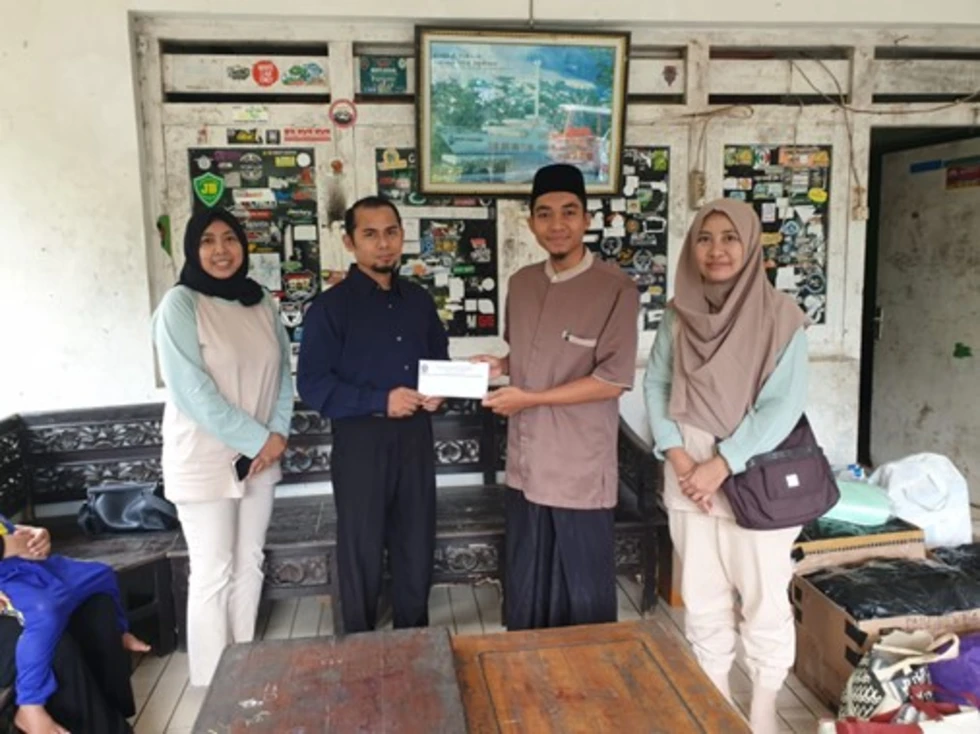 IKWAM SDMP Gelar Bakti Sosial untuk Yatim dan Warga Pacet