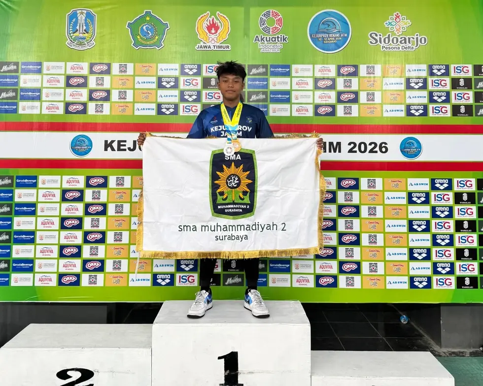 Anasriel ketika berada di podium kejuaraan Provinsi dalam ajang perlombaan renang (1)