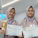 Dua Santriwati PPTQ Ahmad Dahlan Ponorogo Raih Penghargaan Qira’atul Kutub pada FASHMU III Jatim 2026