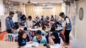 Mahasiswa UMM Dampingi Anak-anak Pekerja Migran Indonesia di Penang, Perkuat Literasi dan Cinta Tanah Air